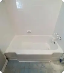 a white bathtub in a bathroom